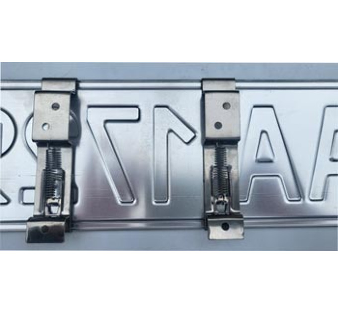 Тримач металевий, пружинний для автомобільних номерів